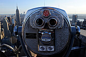 binoculars close-up  from the top of the observation deck on Rockefeller building in New York City, New York State, United State, USA