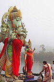 Indian ocean, Mauritius, district of Savanne, Grand Bassin, Hindu temple dedicated to Lord Shiva, Ganesha Statue and people praying
