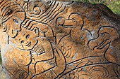 Indian ocean, Mauritius, Le Morne Peninsula, Engraved stone showing a mother and her child next to two dodos