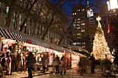 CHRISTMAS TREE LIGHTS BRYANT PARK CHRISTMAS MARKET MANHATTAN NEW YORK CITY USA
