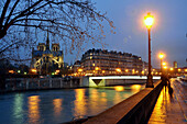 Ile de la Cite at night with Notre Dame, Paris, France