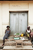 Market women sitting on stairs, Lake Volta, Asuogyaman District, Ghana