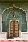 Richly ornated gate into the City Palace, Jaipur, Rajasthan, India