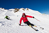 Skiers downhill skiing, Lavoz, Lenzerheide, Graubuenden, Switzerland