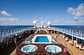 Pool deck of cruise ship MS Delphin Voyager, Atlantic Ocean, near the Azores, Portugal