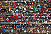 Love locks at Hohenzollern bridge, Cologne, Rhine river, North Rhine-Westphalia, Germany