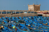 Fishing boats in the marina and the ancient Portuguese Citadel, Essaouira, Morocco