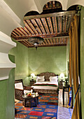 Arched doorway leading into guest room, Dar Les Cigognes, Marrakech, Morocco