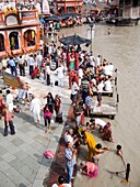 Pilgrims on the ghats on the River Ganges in Haridwar in the state of Uttarakhand in northern India
