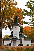 The Crouse Memorial chapel with fall foliage color in Petoskey, Michigan, USA