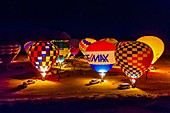 Evening balloon glow, Red Rock Balloon Rally, Red Rock State Park, near Gallup, New Mexico USA