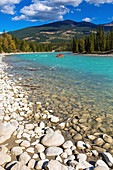 Athabasca River and mountain range in the background, Jasper National Park, Alberta, Canada