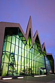 Dusk view of new Riverside Museum of Transport in Glasgow Scotland UK Architect Zaha Hadid