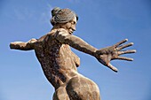 Bliss Dance, a 40-foot statue of a naked dancing woman by sculptor Marco Cochrane on Treasure Island, San Francisco, California, United States of America, USA