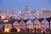 Victorian houses Painted Ladies at Alamo Square and the Skyline of San Francisco at night, California, United States of America, USA