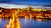 Prague, Hradcany - Old Town, view at Charles Bridge, Vitus Cathedral and the Castle District by night, Prague, Czech Republic