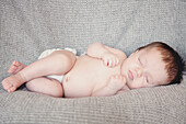 Newborn Baby Sleeping in Diaper