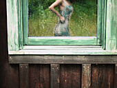 Woman's Torso Reflected in Window