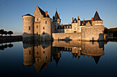 The Renaissance Chateau Of Sully-Sur-Loire At Sunset, Loiret (45), France
