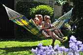 Family Relaxing In A Hammock, Cayeux-Sur-Mer, Bay Of Somme, Somme (80), France