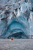 Man Kayaking In A Self Made Wooden Kayak In Front Of Shoup Glacier, Shoup Bay State Marine Park, Prince William Sound Southcentral Alaska
