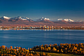 Aerial View Of Anchorage, Looking To The South With The Chugach Mountain Range In The Background, During Autumn In Southcentral, Alaska