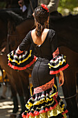 'Spain, Andalusia, A Woman Dressed In A Costume For The April Fair; Seville'