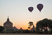Myanmar, Bagan, Hot Air Balloons over Ancient Ruins