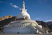 The Shanti (Peace) Stupa in Changspa looking over Leh.  Leh was the capital of the Himalayan kingdom of Ladakh, now the Leh District in the state of Jammu and Kashmir, India.  Leh is at an altitude of 3, 500 meters (11, 483 ft).  © James Sparshatt / Axiom