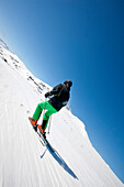 Skier downhill skiing, Laax, Canton of Grisons, Switzerland