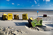 Beach chairs on the beach after a stormy night, Langeoog Island, North Sea, East Frisian Islands, East Frisia, Lower Saxony, Germany, Europe