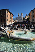 Bernini fountain on the Piazza de Spagna and the Spanish steps, Rome, Italy