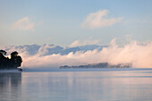 Lake Starnberg in morning mist, Upper Bavaria, Bavaria, Germany