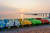 Pier and peddle boats on the beach, Baltic Sea, Timmendorfer Strand, Schleswig-Holstein, Germany