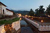 The Temple of the Tooth Sri Dalada Maligawa with fairy light garlands ready for the perahera festival, Kandy, Sri Lanka