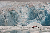 Tourists viewing Dawes Glacier from zodiac, Endicott Arm, southeast Alaska