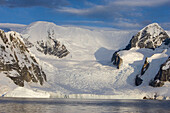 Mountains and glacier at sunset, Cuverville Island, Antarctica