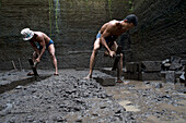 Javanese workers in a stone quarry in the Southwest of Bali, Indonesia