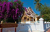 Luang Phabang National Museum with gold and wonderful architecture with flowers temple in Laos Loa Asia