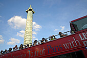 Victory column at Place Vendome with tour bus in the foreground, Paris, France, Europe