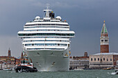 Cruise ship being towed in Giudecca Canal, No Grandi Navi, near San Giorgio Maggiore, Venice, Italy