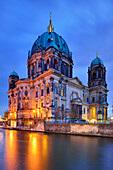 Illuminated Berlin cathedral above the river Spree, Berlin, Germany