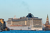 Cruise ship protest, Cruise ship being towed in the Giudecca Canal near San Giorgio Maggiore, Venice, Veneto, Italy