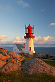 Lighthouse on rocks at Kap Lindesnes, Province of Vest-Agder, Soerlandet, Norway, Europe