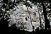 Woman rock climbing, Finale Ligure, Province of Savona, Liguria, Italy