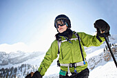 A woman skis in Utah under bright, blue skies Salt Lake City, Utah, USA