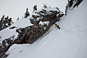 A telemark skier in a narrow chute in Montana Bozeman, Montana, USA