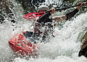 Man kayaks in whitewater rapids on Wilson Creek, NC Collettsville, NC, USA