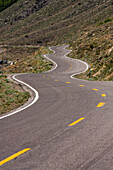 A twisting road  in the Sierra mountains of California, June Lake, CA, USA