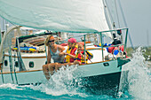 A family out for a day sail in Georgetown, Exumas, Georgetown, Exumas, Bahamas